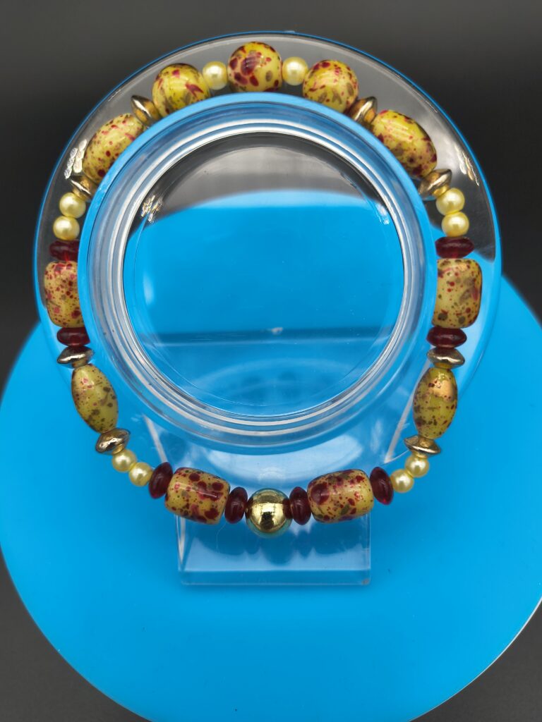 83-bracelet-with-red-speckled-resin-beads
