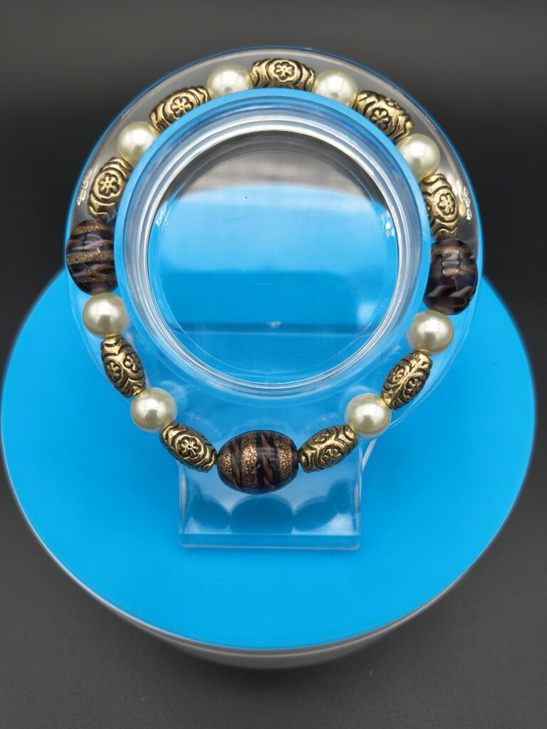 46-metal-beads-stand-out-on-this-piece